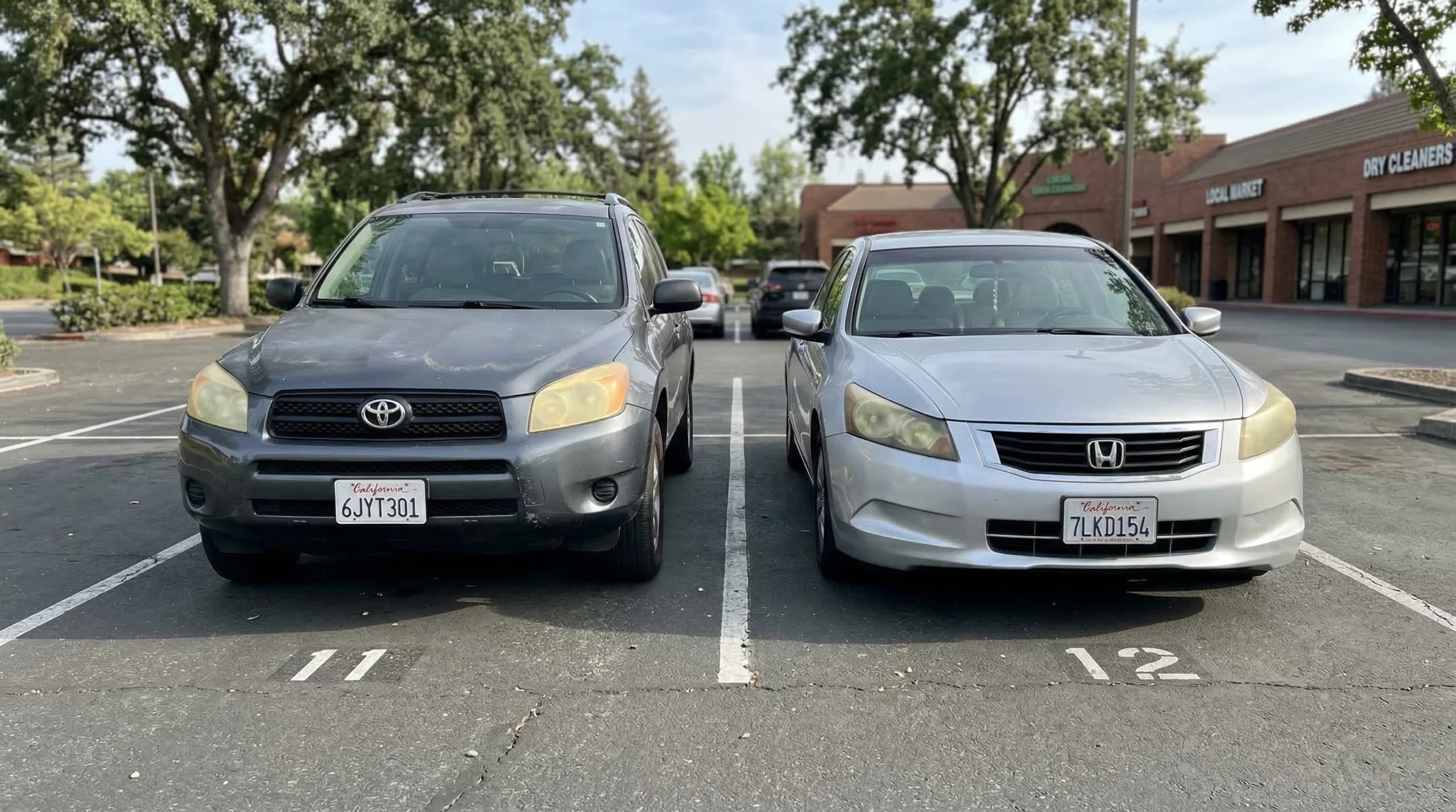 Two cars parked side by side